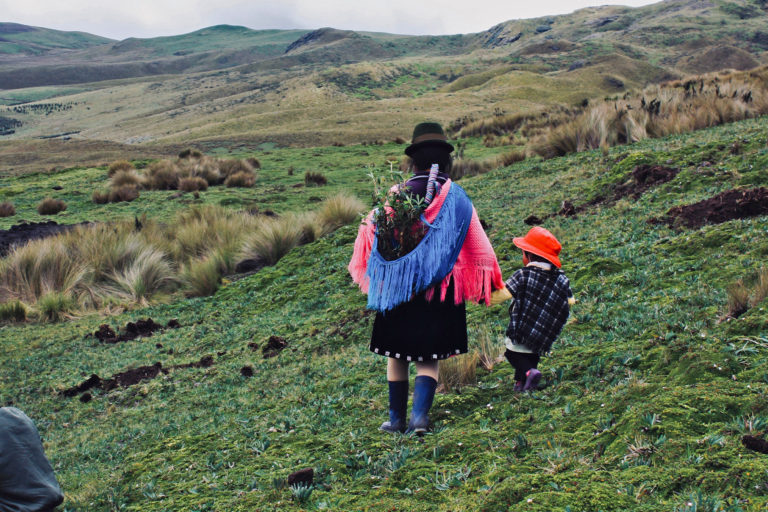 Members of an Indigenous community in Guangaje, Ecuador after the blessing of a water spring. Image by Azzedine Rouichi via Unsplash (Public domain).