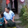“Naná" Gracia is an Indigenous P'urhépecha midwife, seen here in her ekuarho with granddaughter Alma in Angahuan, Michoachán, Mexico. Image by Monica Pelliccia for Mongabay.