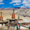 Chörtens right outside the walled city of Lo Manthang. Image by Jean-Marie Hullot via Flickr (CC BY 2.0 Deed).