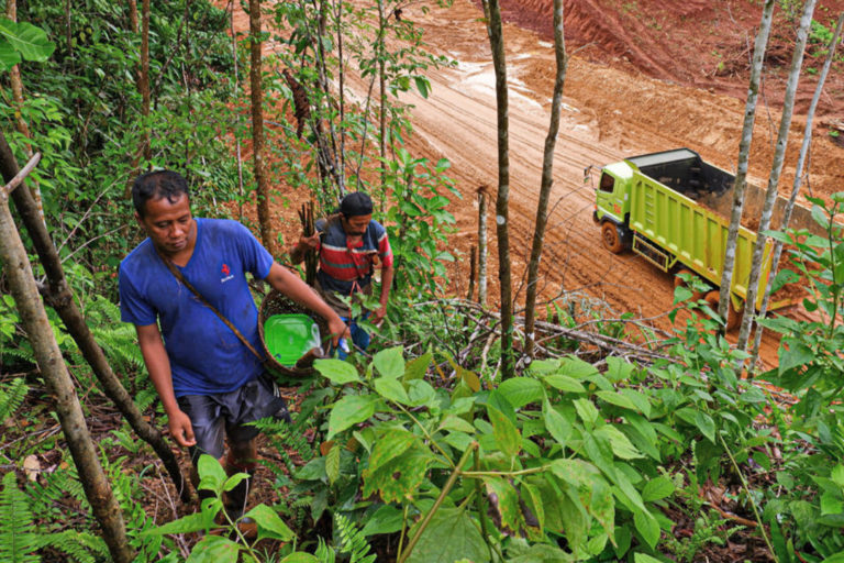 The main road built by PT Gema Kreasi Perdana