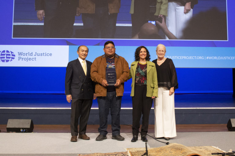 Rede Wayuri co-founder Marivelton Barroso and ISA socioenvironmental policy specialist Juliana Radler receive the 2022 Rule of Law Award.