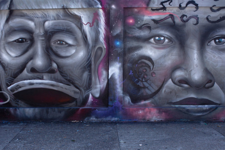 A mural depicting Indigenous faces stretches across a wall in the historic center of Manaus, in the Brazilian state of Amazonas.