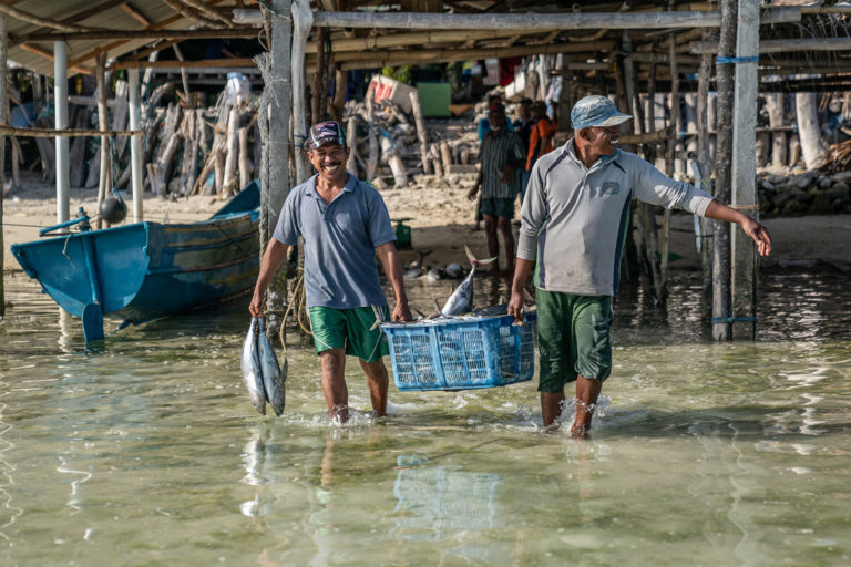 Fishers in Siompu, Southeast Sulawesi with their daily catch. September 2019. Photo credit: Rare.