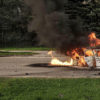 A car burns with two people inside, after a Russian bombardment in Kharkiv, Ukraine, Thursday, April 21, 2022. Image by AP Photo/Felipe Dana via Flickr.