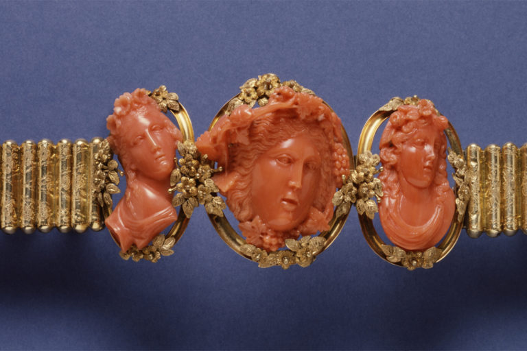 A bracelet with figurines carved from highly prized red coral.