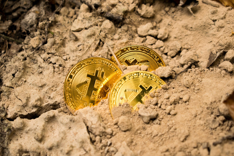 Although Bitcoin is a virtual currency, some collectors trade metal coins with codes for amounts of Bitcoin printed on them, not unlike a gift certificate. Photo by Dmitry Demidko on Unsplash.