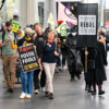 People protest against ExxonMobil in Melbourne, Australia.