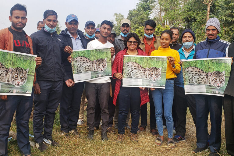 Raising awareness about fishing cats during an education program.