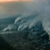 Fire near the Manicoré River in Amazonas state in August 2022. Photo © Christian Braga / Greenpeace