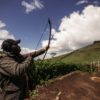 Kibiwot displaying his archery skills at his makeshift home in the Embobut, which has been burned down many times by KFS as part of forceful evictions.