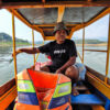 Maman Ajo makes a living selling boats.