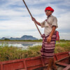 A Karen man in his boat in Myanmar.