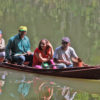 Members of the Quilombolas community make their way across.