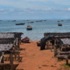 Drying fish on raised racks instead of the sand reduced the fish waste, a success of the UN Food and Agricultural Organization (FAO). Photo by Robert Bociaga for Mongabay.